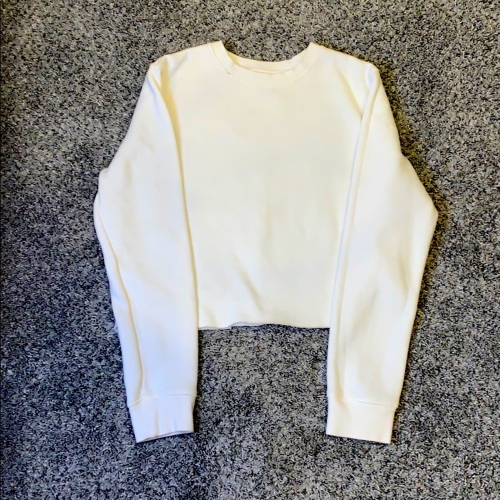 White long sleeve cropped shirt.